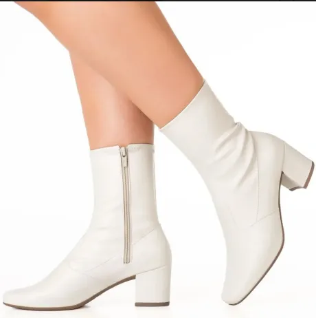 https://produto.mercadolivre.com.br/MLB-2206061175-bota-branca-feminina-stretch-bico-quadrado-salto-grosso-_JM?attributes=COLOR_SECONDARY_COLOR%3AT2ZmIFdoaXRl%2CSIZE%3AMzkgQlI%3D#origin%3Dshare%26sid%3Dshare